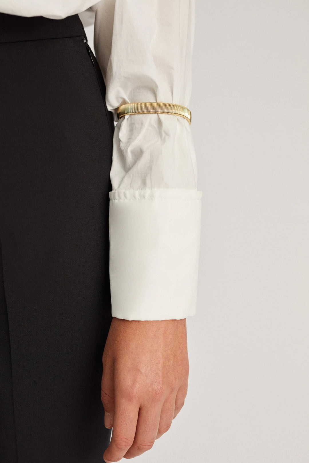 Gold sleeve keepers pair minimalist elastic sleeve garters for holding sleeves in place

