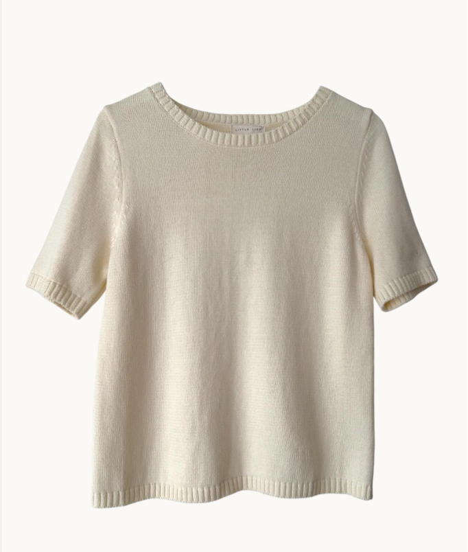 Beige short-sleeve sweater on a white background