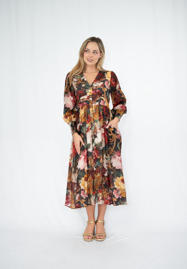 Woman wearing a floral dress on a white background